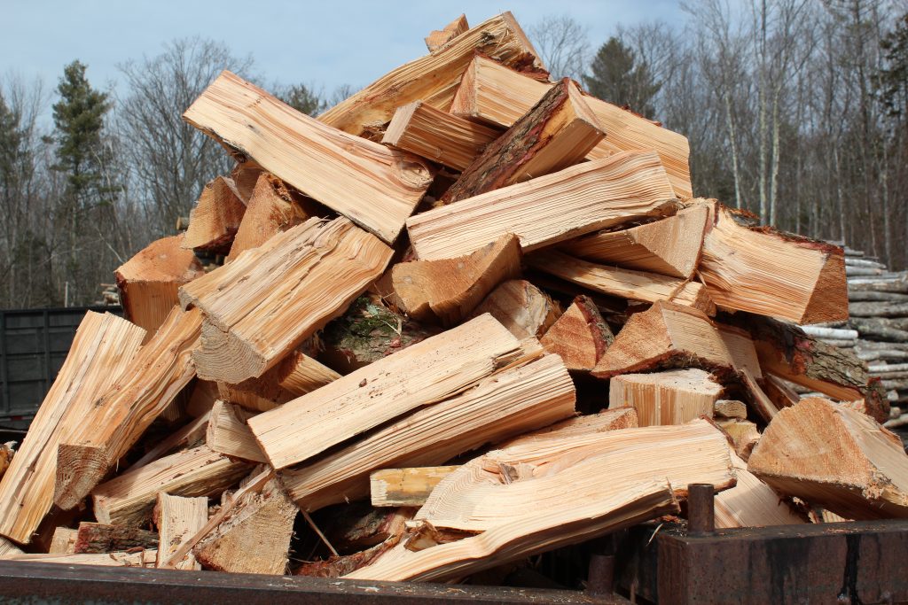 pile of Eastern Hemlock logs