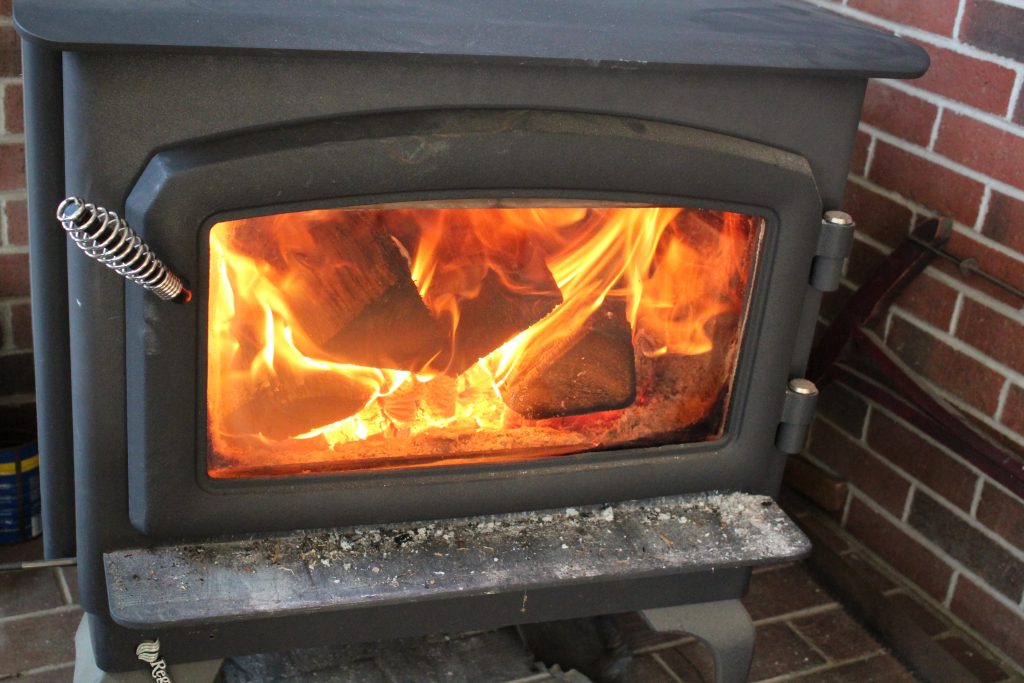 Eastern Hemlock burning in stove